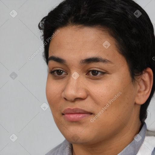 Joyful latino young-adult female with short  black hair and brown eyes