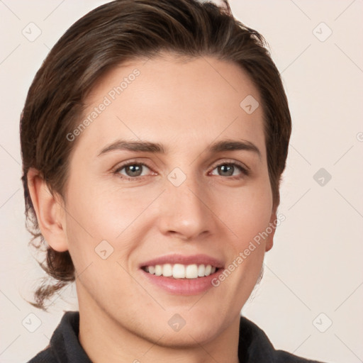 Joyful white young-adult female with medium  brown hair and grey eyes