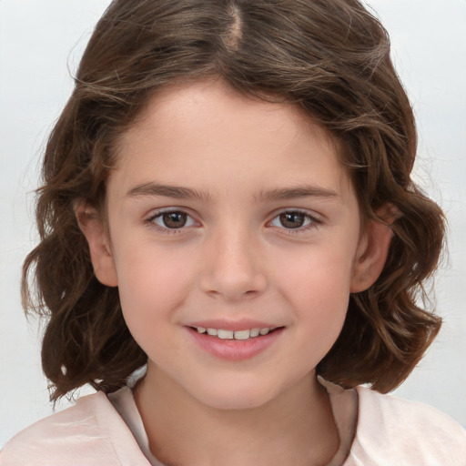 Joyful white child female with medium  brown hair and brown eyes