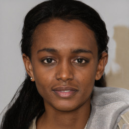 Neutral black young-adult female with short  brown hair and brown eyes
