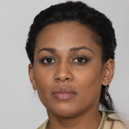 Neutral black young-adult female with short  brown hair and brown eyes