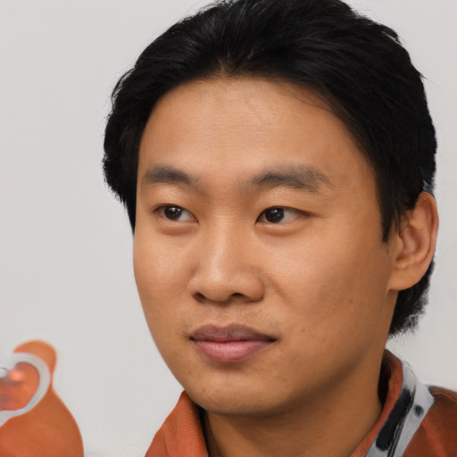 Neutral asian young-adult male with short  black hair and brown eyes