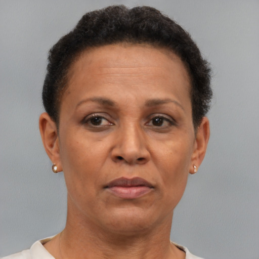 Neutral black adult female with short  brown hair and brown eyes