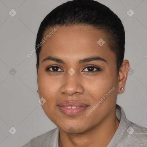 Joyful black young-adult female with short  black hair and brown eyes