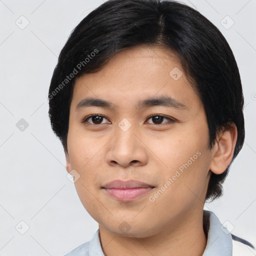 Joyful asian young-adult male with short  black hair and brown eyes