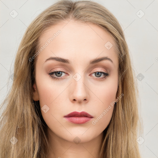 Neutral white young-adult female with long  brown hair and brown eyes