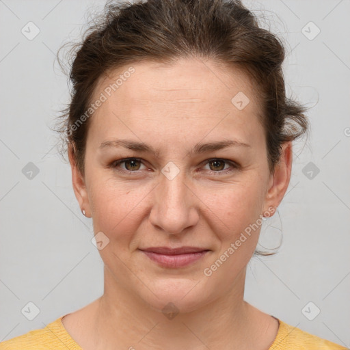 Joyful white adult female with short  brown hair and brown eyes