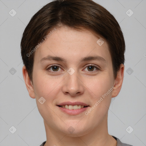 Joyful white young-adult female with short  brown hair and brown eyes