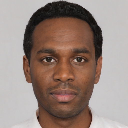 Neutral black young-adult male with short  black hair and brown eyes