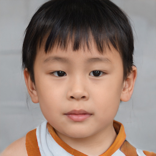 Neutral asian child male with short  brown hair and brown eyes