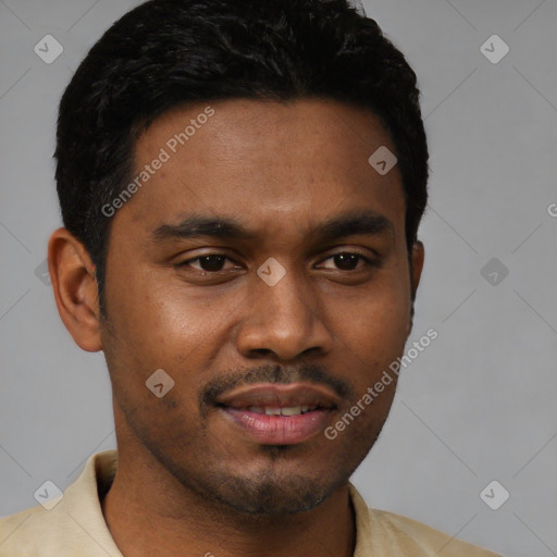 Joyful latino young-adult male with short  black hair and brown eyes