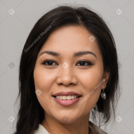 Joyful latino young-adult female with long  brown hair and brown eyes