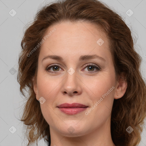 Joyful white young-adult female with long  brown hair and green eyes