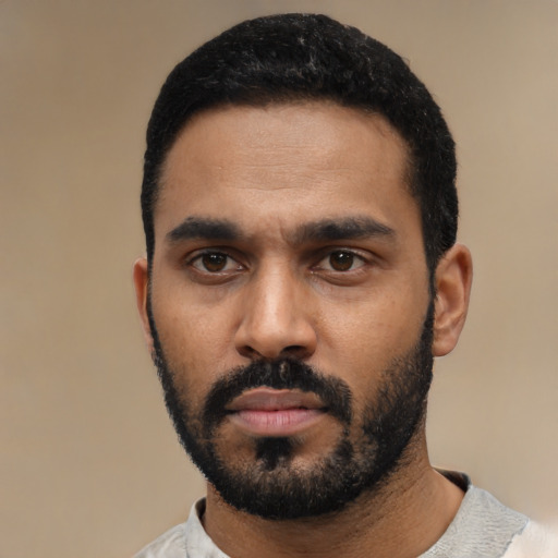 Neutral black young-adult male with short  black hair and brown eyes