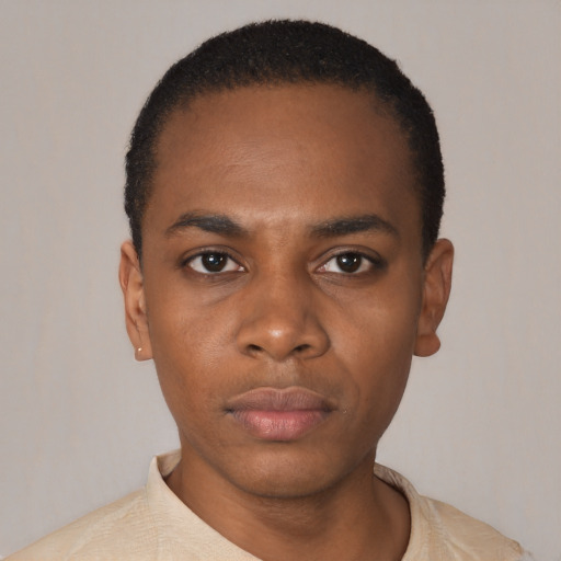 Neutral black young-adult male with short  black hair and brown eyes