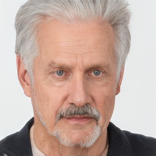 Neutral white middle-aged male with short  gray hair and grey eyes