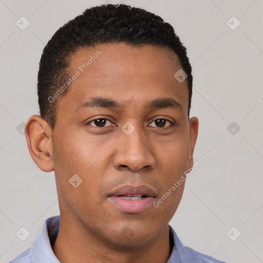 Neutral latino young-adult male with short  black hair and brown eyes