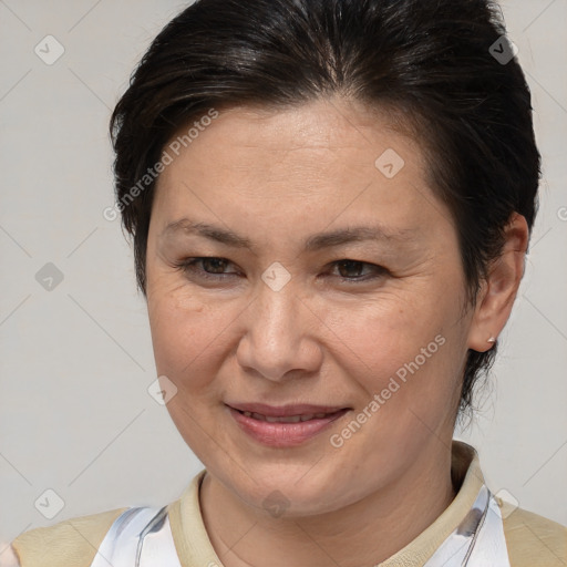 Joyful white adult female with medium  brown hair and brown eyes