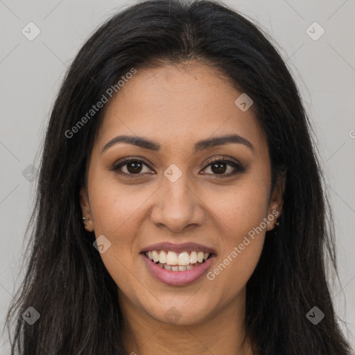 Joyful latino young-adult female with long  brown hair and brown eyes