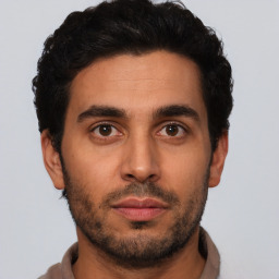 Neutral latino young-adult male with short  brown hair and brown eyes