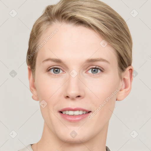 Joyful white young-adult female with short  brown hair and grey eyes