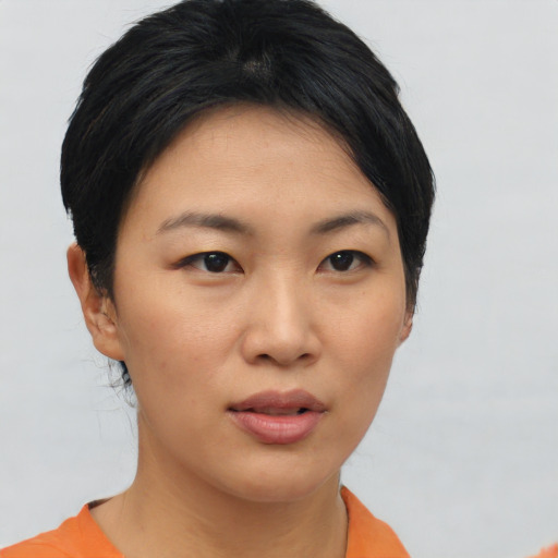 Neutral asian young-adult female with short  black hair and brown eyes