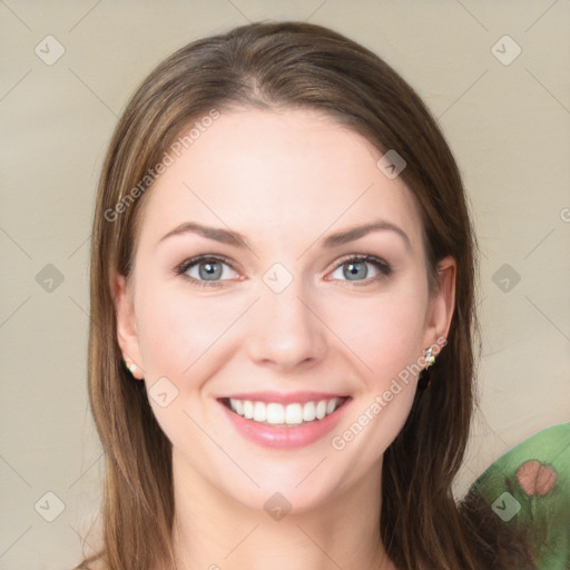 Joyful white young-adult female with long  brown hair and green eyes