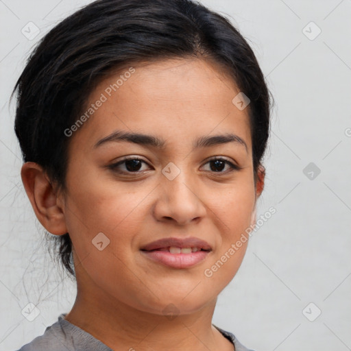 Joyful latino young-adult female with short  brown hair and brown eyes