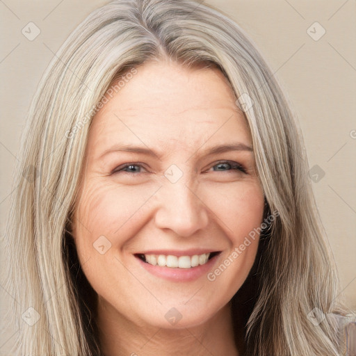 Joyful white adult female with long  brown hair and brown eyes