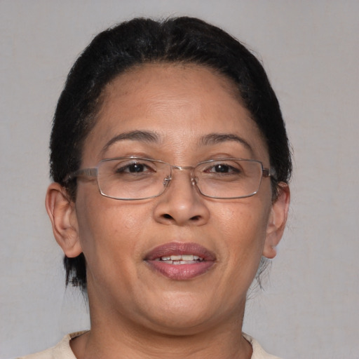 Joyful asian adult female with short  brown hair and brown eyes