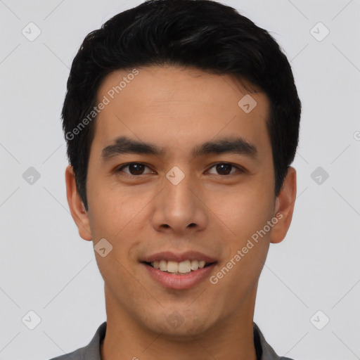 Joyful asian young-adult male with short  black hair and brown eyes