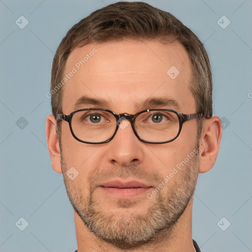 Joyful white adult male with short  brown hair and brown eyes