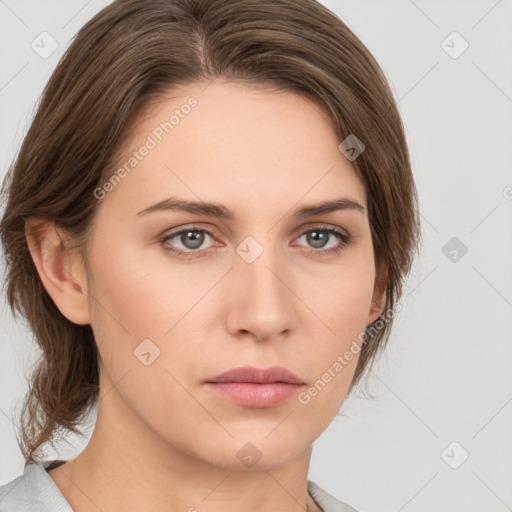 Neutral white young-adult female with medium  brown hair and grey eyes