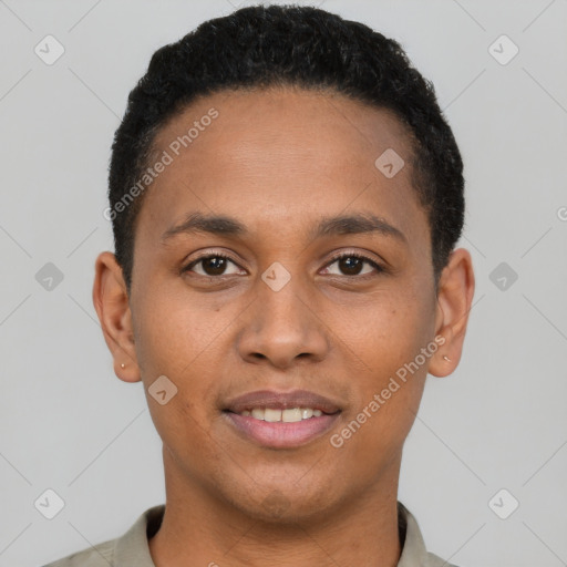 Joyful black young-adult male with short  black hair and brown eyes
