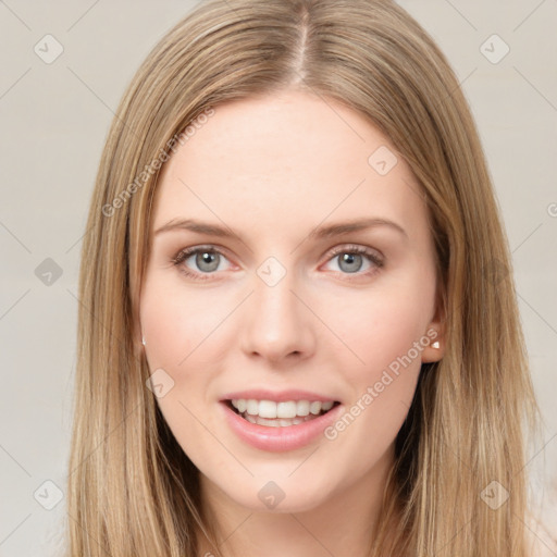 Joyful white young-adult female with long  brown hair and green eyes