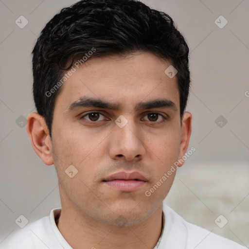 Neutral white young-adult male with short  brown hair and brown eyes