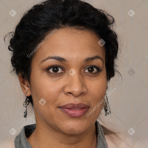 Joyful latino adult female with medium  brown hair and brown eyes