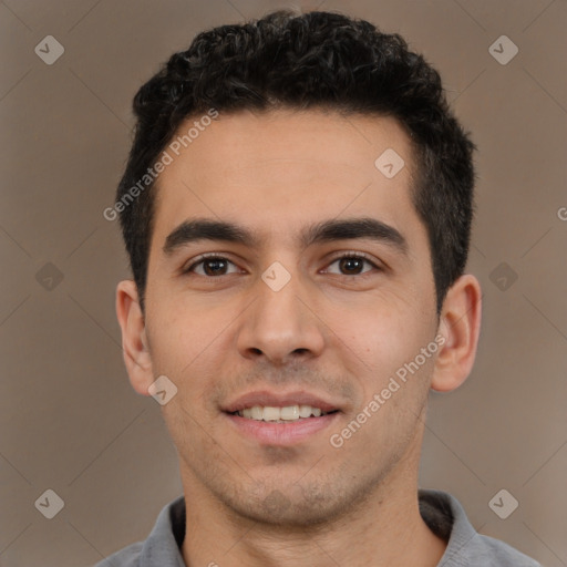 Joyful white young-adult male with short  black hair and brown eyes