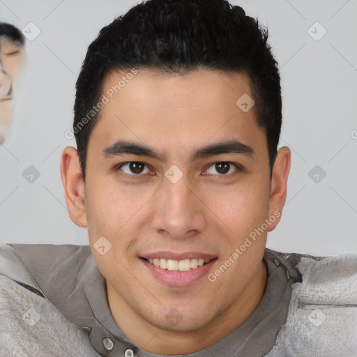 Joyful latino young-adult male with short  brown hair and brown eyes