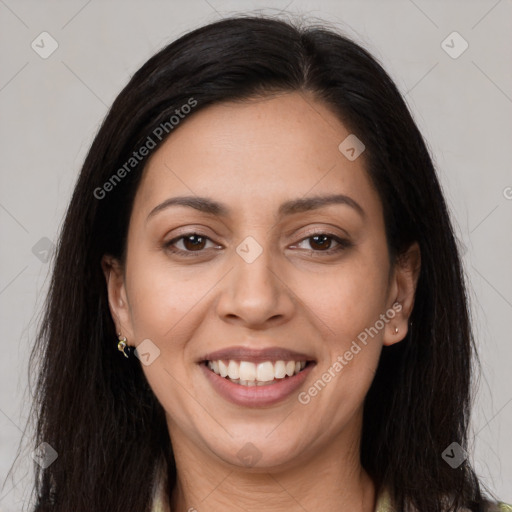 Joyful latino young-adult female with long  brown hair and brown eyes