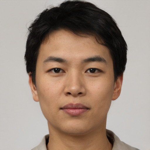 Neutral asian young-adult male with short  black hair and brown eyes