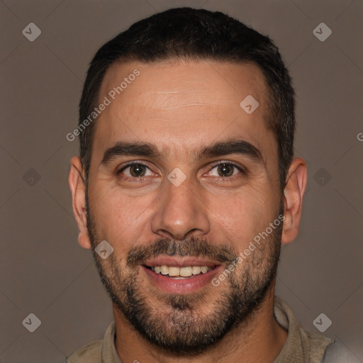 Joyful white adult male with short  brown hair and brown eyes