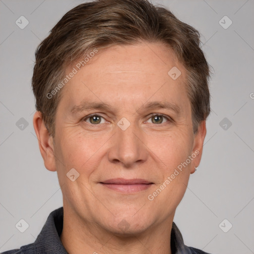 Joyful white adult male with short  brown hair and grey eyes