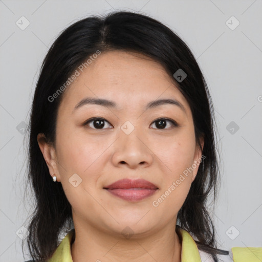 Joyful asian young-adult female with medium  brown hair and brown eyes