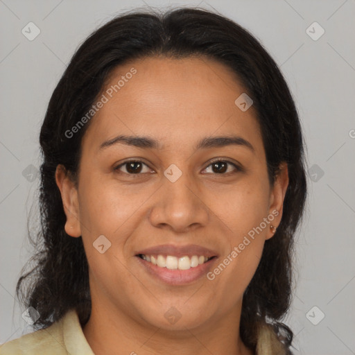 Joyful latino young-adult female with medium  brown hair and brown eyes