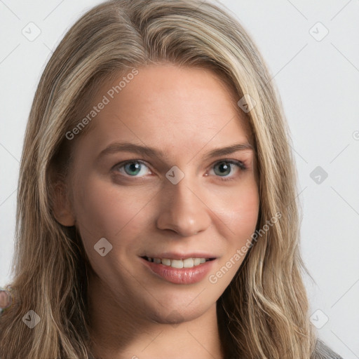 Joyful white young-adult female with long  brown hair and green eyes