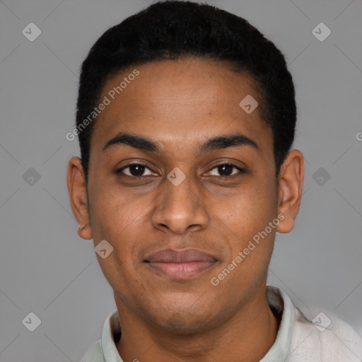 Joyful black young-adult male with short  black hair and brown eyes