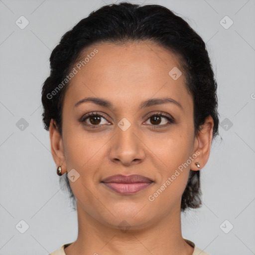 Joyful latino young-adult female with short  brown hair and brown eyes