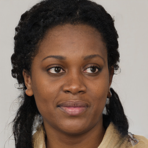Neutral black young-adult female with long  black hair and brown eyes