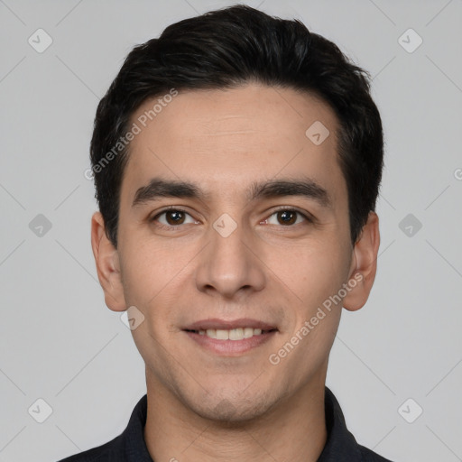 Joyful white young-adult male with short  black hair and brown eyes